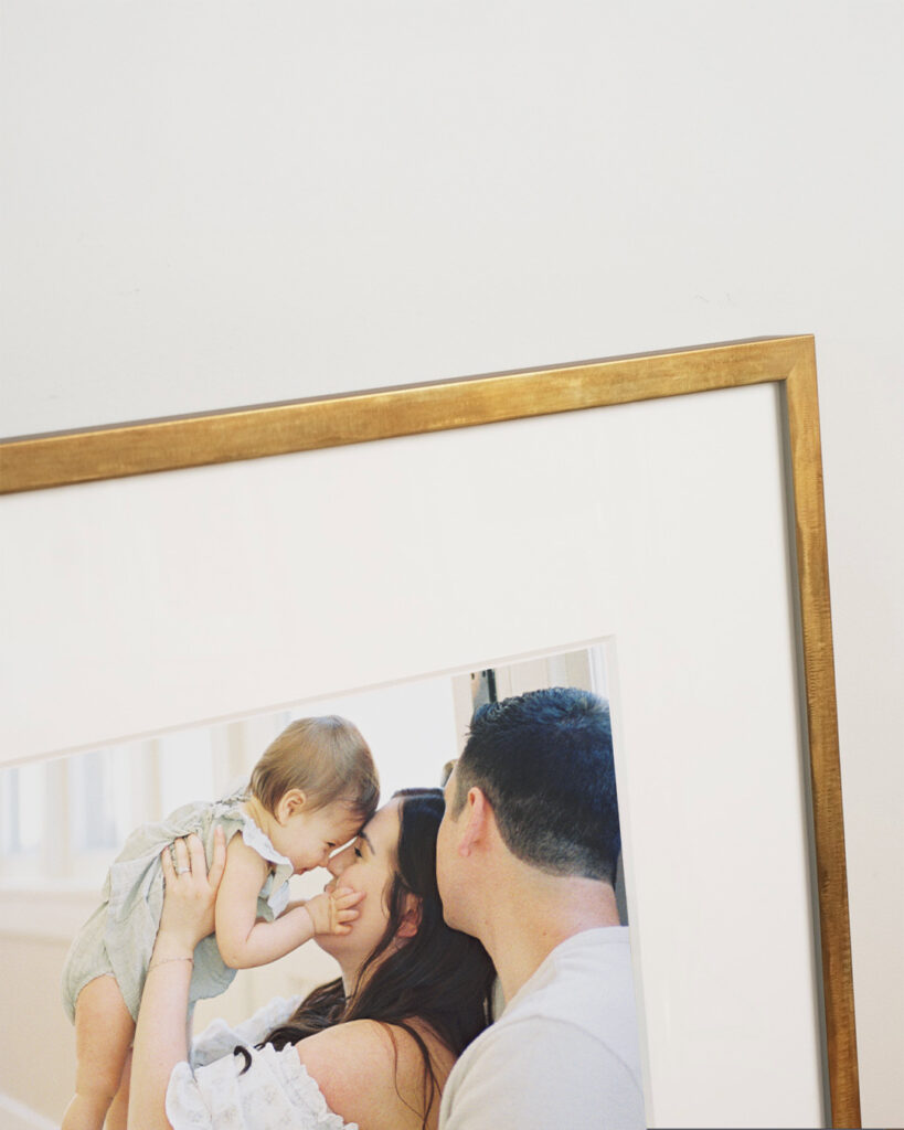 A custom framed print from an in home family session taken in Argyle, Texas.