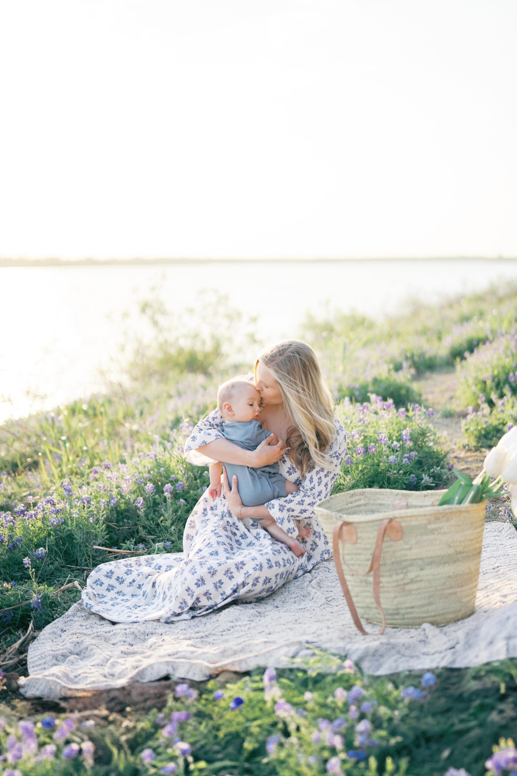 Photo of mom and baby during a bluebonnet session in Flower Mound, Texas