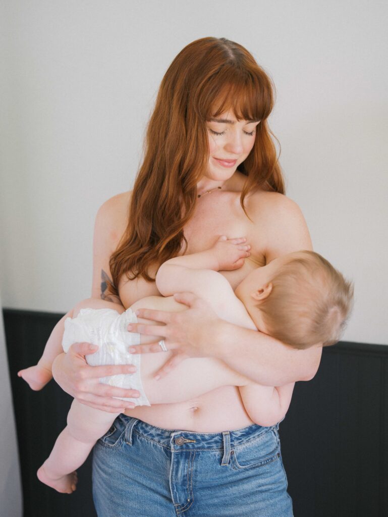 A moment between a mom and her son while breastfeeding